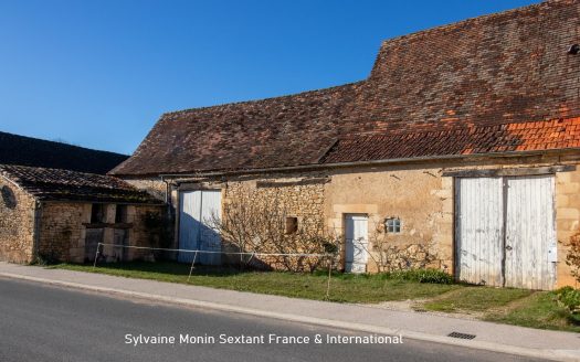 Renovated character house with outbuildings and large enclosed grounds