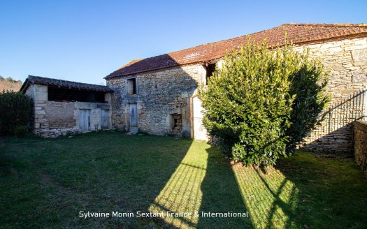 Renovated character house with outbuildings and large enclosed grounds