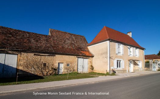 Renovated character house with outbuildings and large enclosed grounds