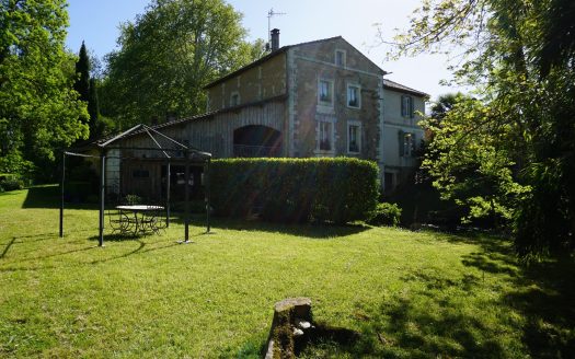 Authentic 19th century water mill with its paddle wheel.